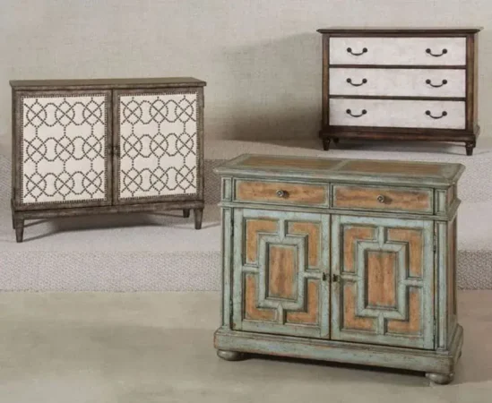 Three vintage-style wooden cabinets with unique designs.