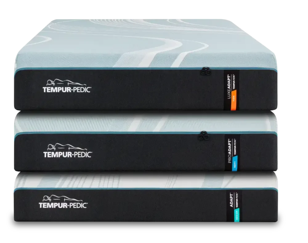 Three stacked Tempur-Pedic mattresses, different firmness options.