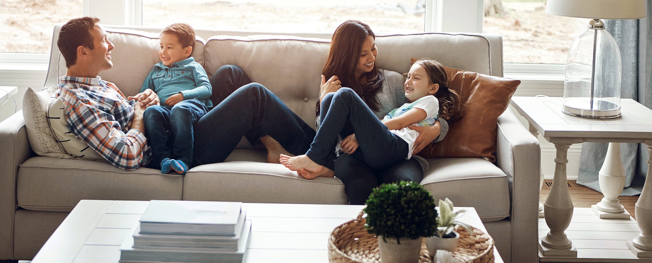 Family relaxing on a sofa