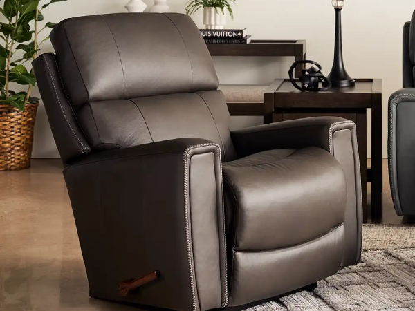 Comfortable brown leather recliner in modern living room.