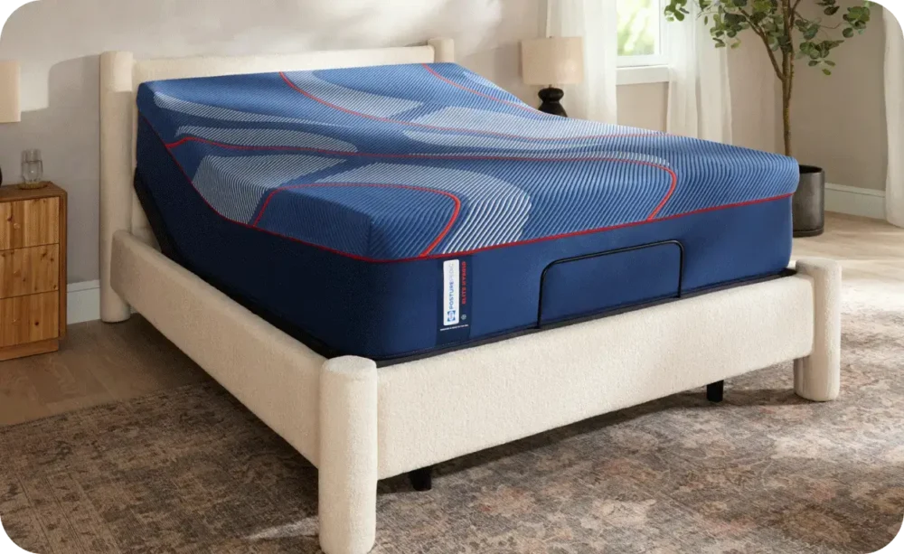 Adjustable comfort mattress on modern bed frame.