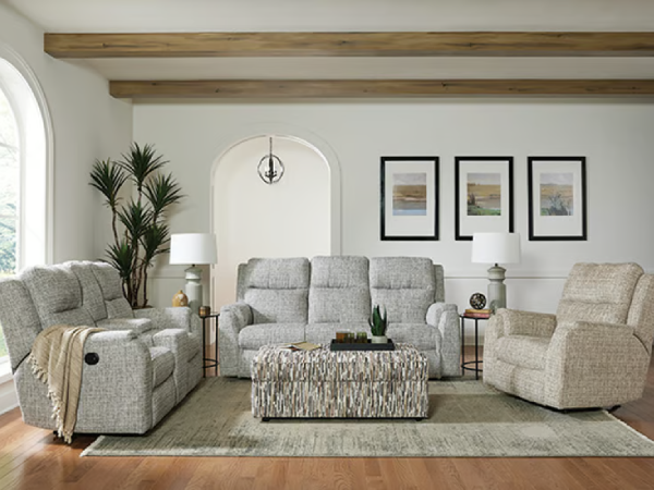 Modern living room with gray furniture and decor.