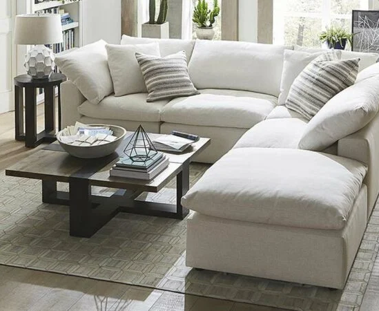 Modern living room with white sectional sofa.